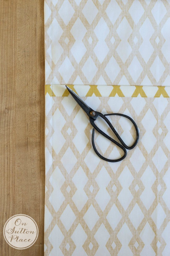 Step by step directions are included in this envelope pillow cover tutorial, including how to finish the inside with a french seam.