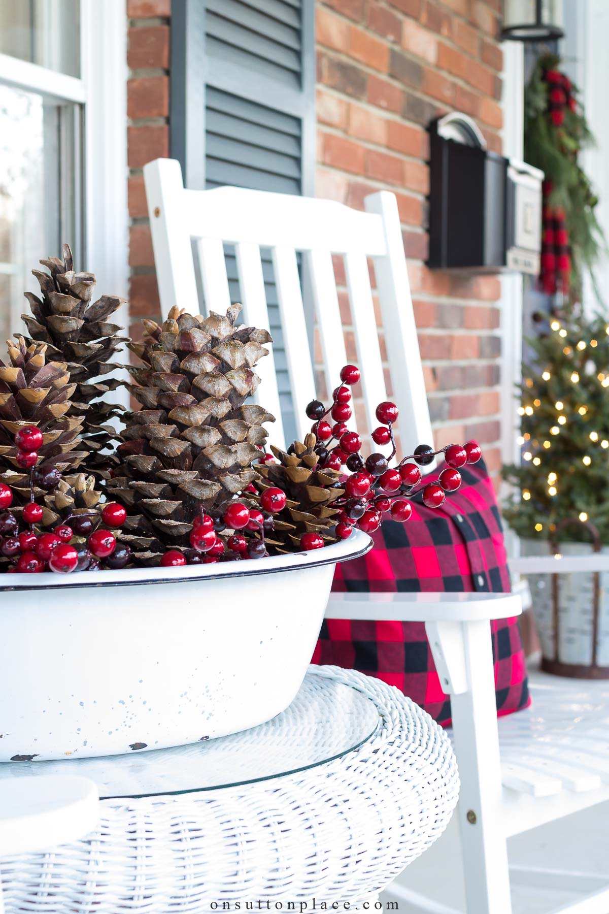 https://www.onsuttonplace.com/wp-content/uploads/2015/12/red-and-black-christmas-porch-decor-2023.jpg