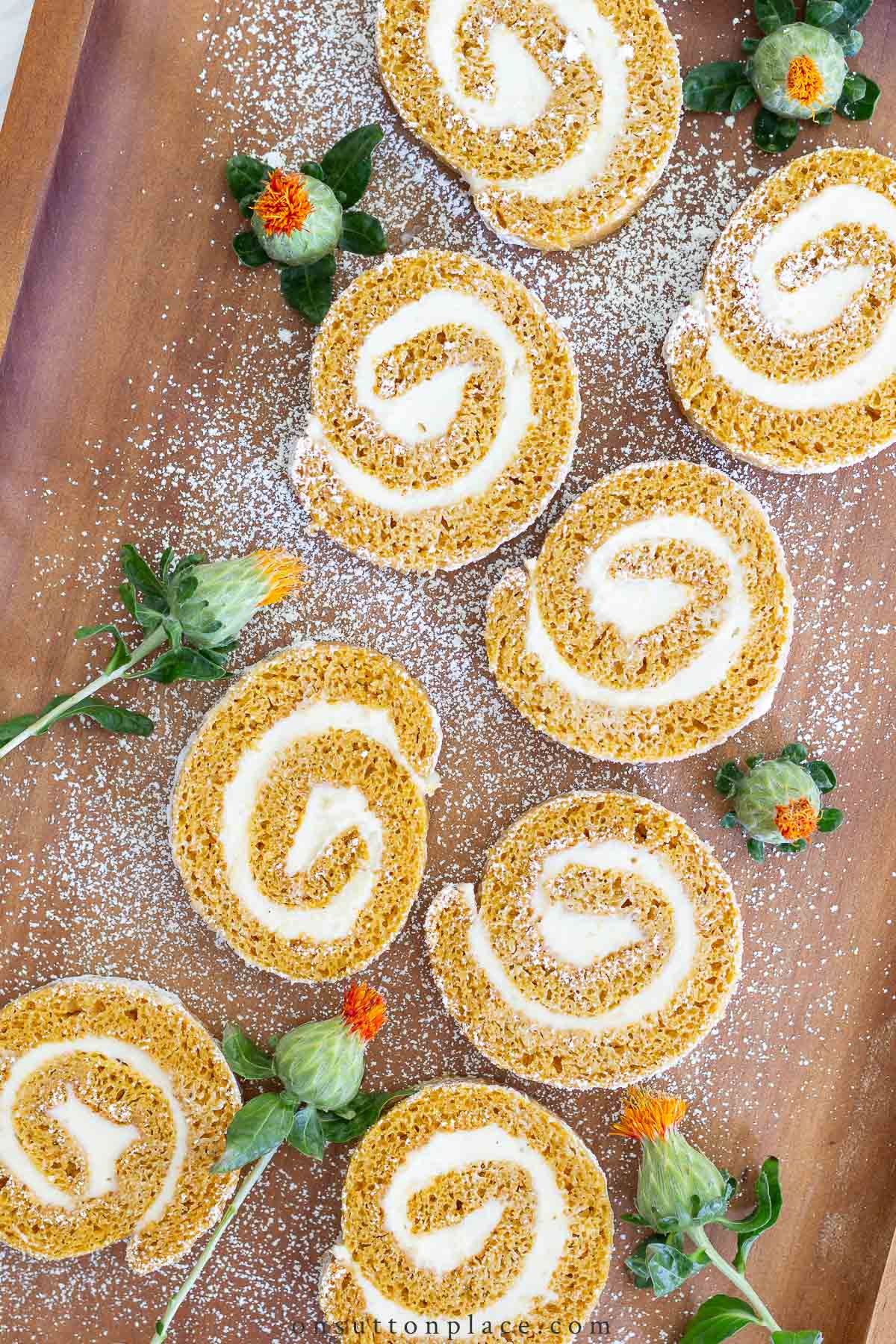 https://www.onsuttonplace.com/wp-content/uploads/2017/08/pumpkin-roll-recipe-slices.jpg