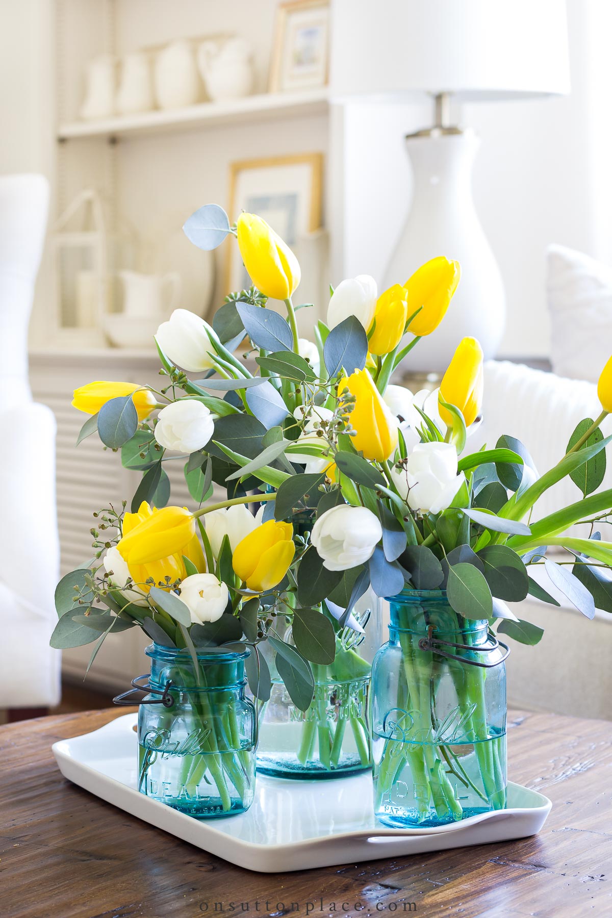 https://www.onsuttonplace.com/wp-content/uploads/2019/02/group-of-mason-jars-on-tray-with-tulips-2022.jpg