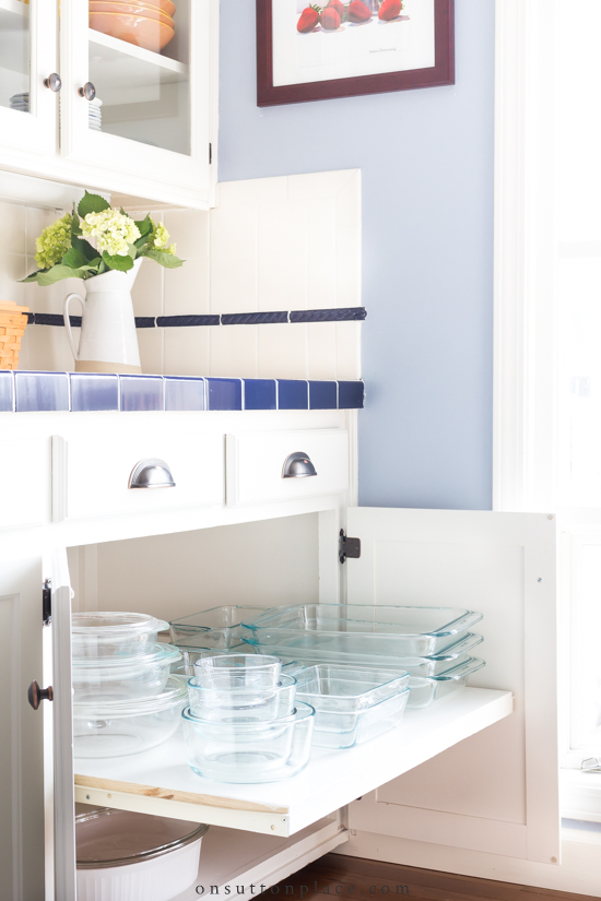 https://www.onsuttonplace.com/wp-content/uploads/2019/03/pyrex-in-kitchen-cabinet-pull-out-shelf.jpg