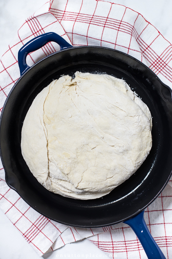 https://www.onsuttonplace.com/wp-content/uploads/2020/09/rustic-bread-recipe-dough-in-skillet.jpg