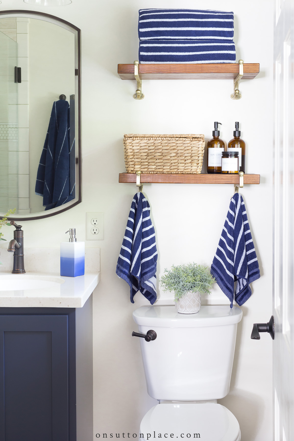 Our navy and brass bathroom — The Pastiche