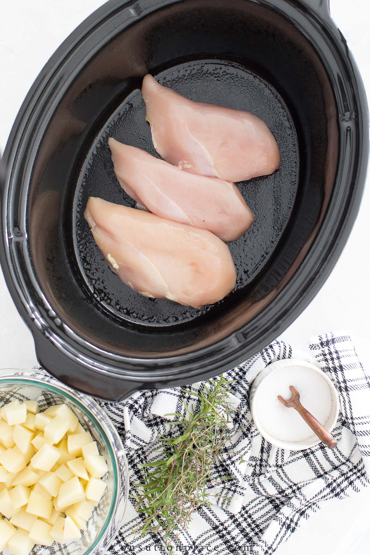 https://www.onsuttonplace.com/wp-content/uploads/2021/12/chicken-breasts-in-slow-cooker-insert.jpg