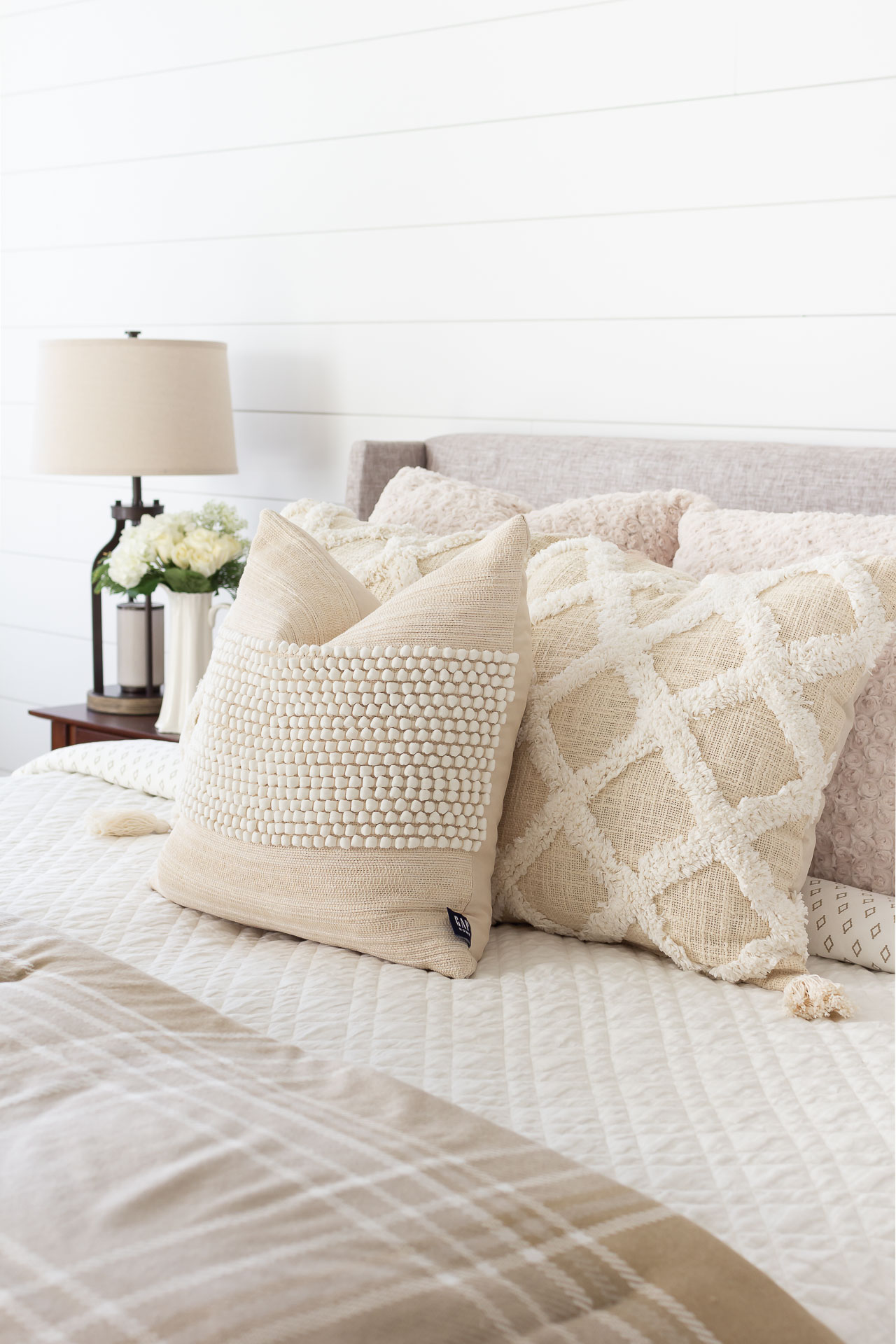 https://www.onsuttonplace.com/wp-content/uploads/2021/12/neutral-pillows-on-bed.jpg