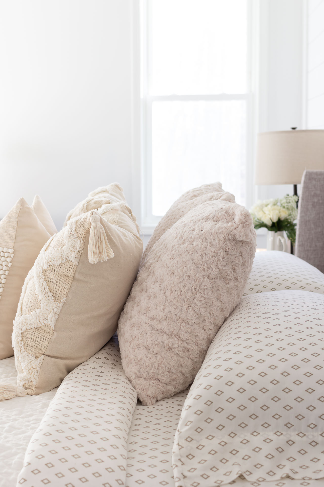 Adding Interest to Layered Neutral Bedding - On Sutton Place