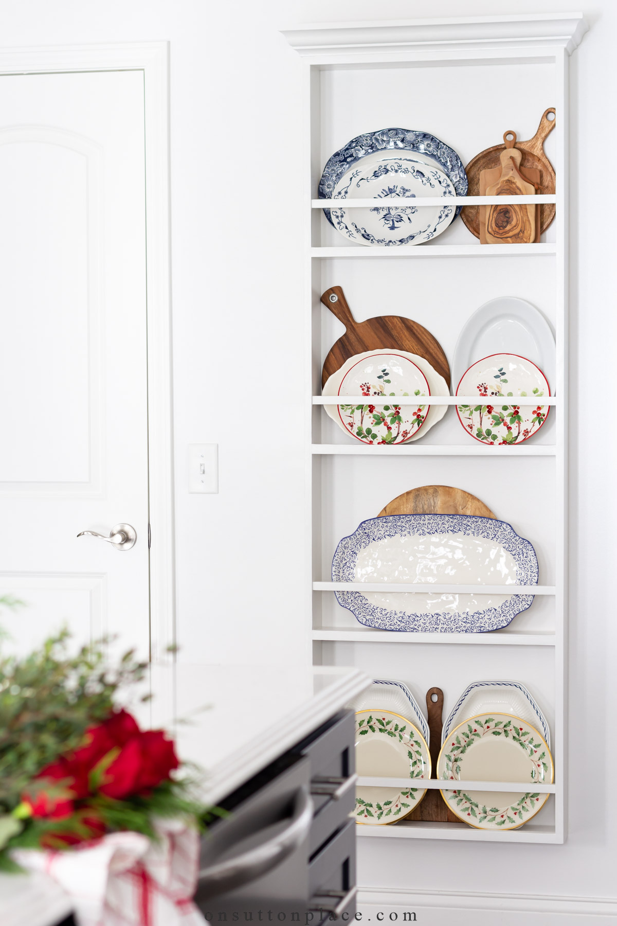 https://www.onsuttonplace.com/wp-content/uploads/2022/12/christmas-plates-on-plate-rack.jpg