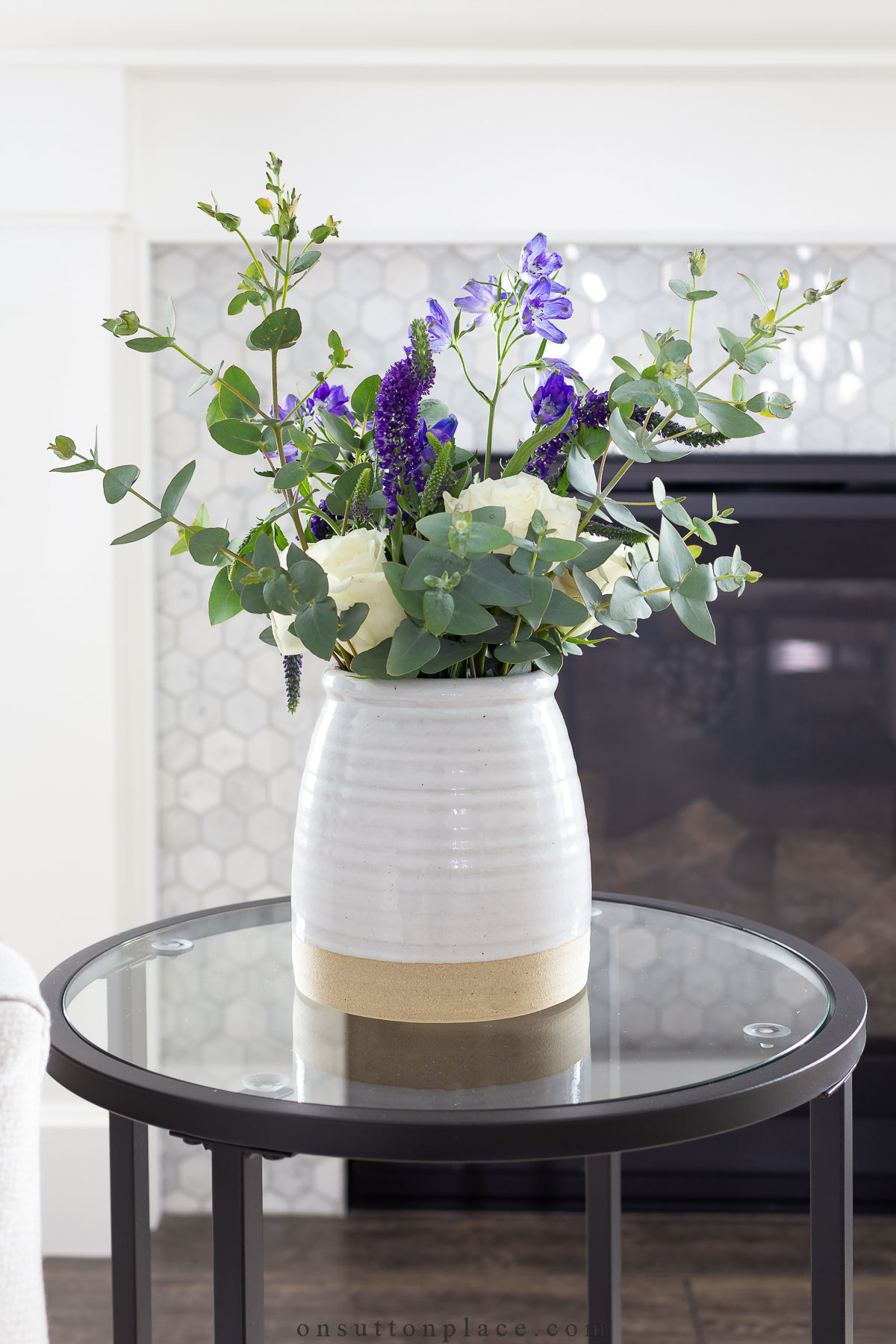 https://www.onsuttonplace.com/wp-content/uploads/2023/01/farmhouse-jug-of-fresh-flowers-on-round-table-1.jpg