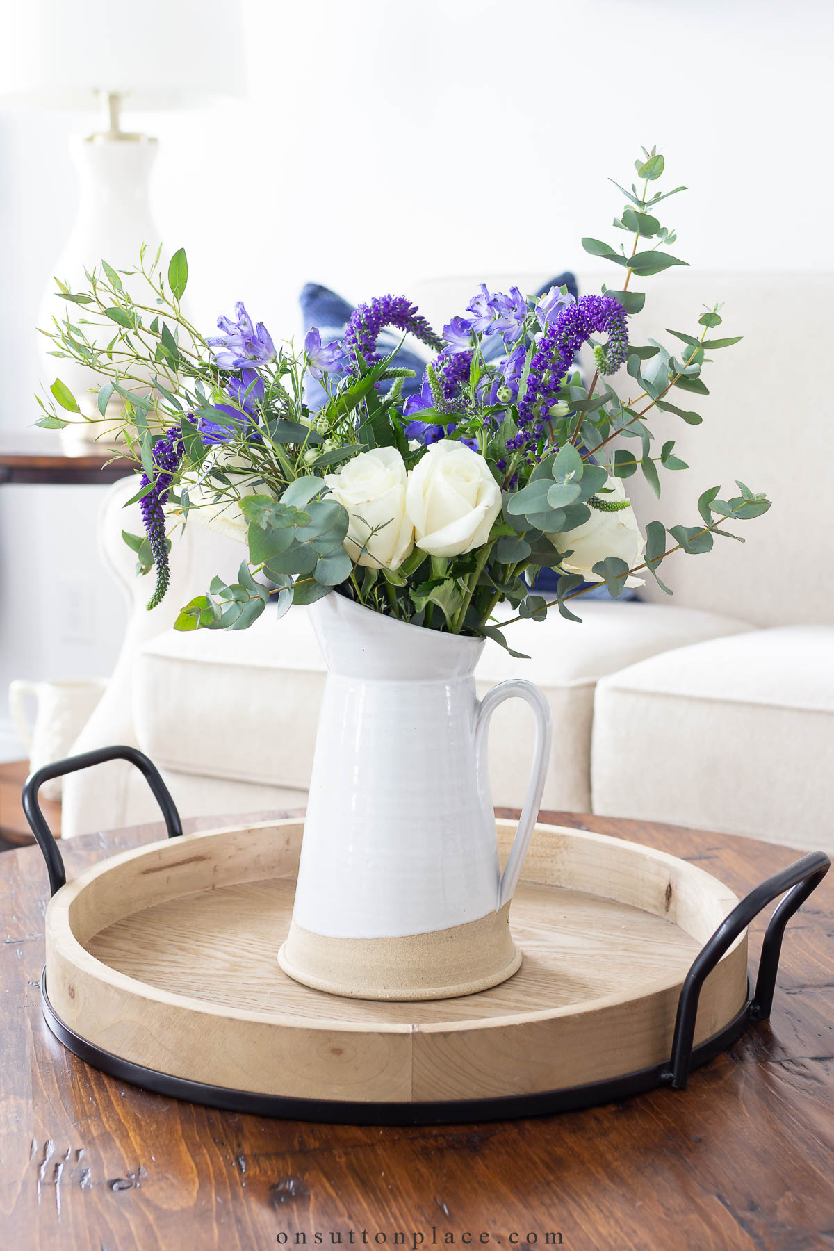 https://www.onsuttonplace.com/wp-content/uploads/2023/01/pitcher-of-flowers-on-round-tray.jpg