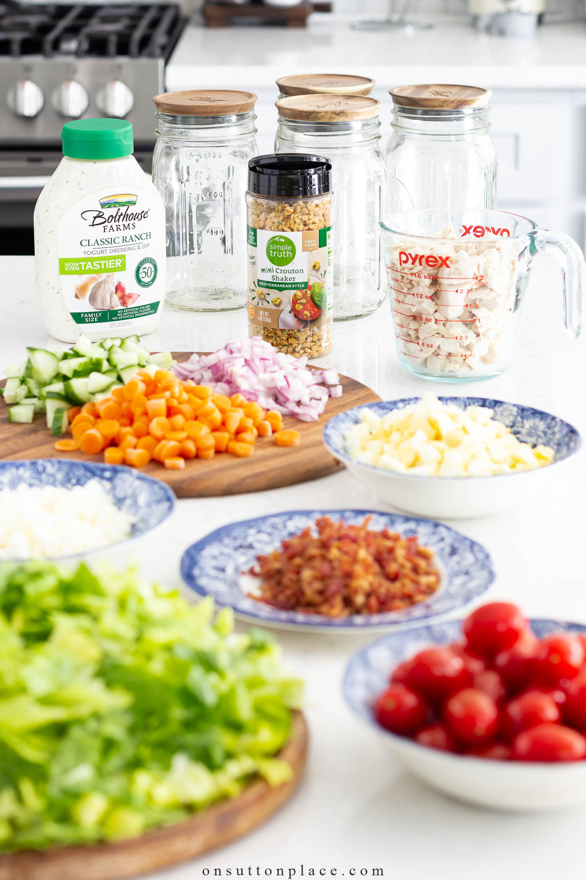 https://www.onsuttonplace.com/wp-content/uploads/2023/04/ingredients-for-meal-prep-salads.jpg