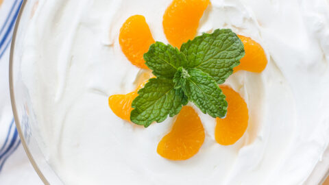 https://www.onsuttonplace.com/wp-content/uploads/2023/05/orange-fluff-jello-dessert-with-oranges-and-mint-garnish-480x270.jpg